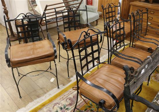 Six iron patio chairs with leather cushions